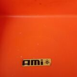 Pair of AMI stools in orange plastic