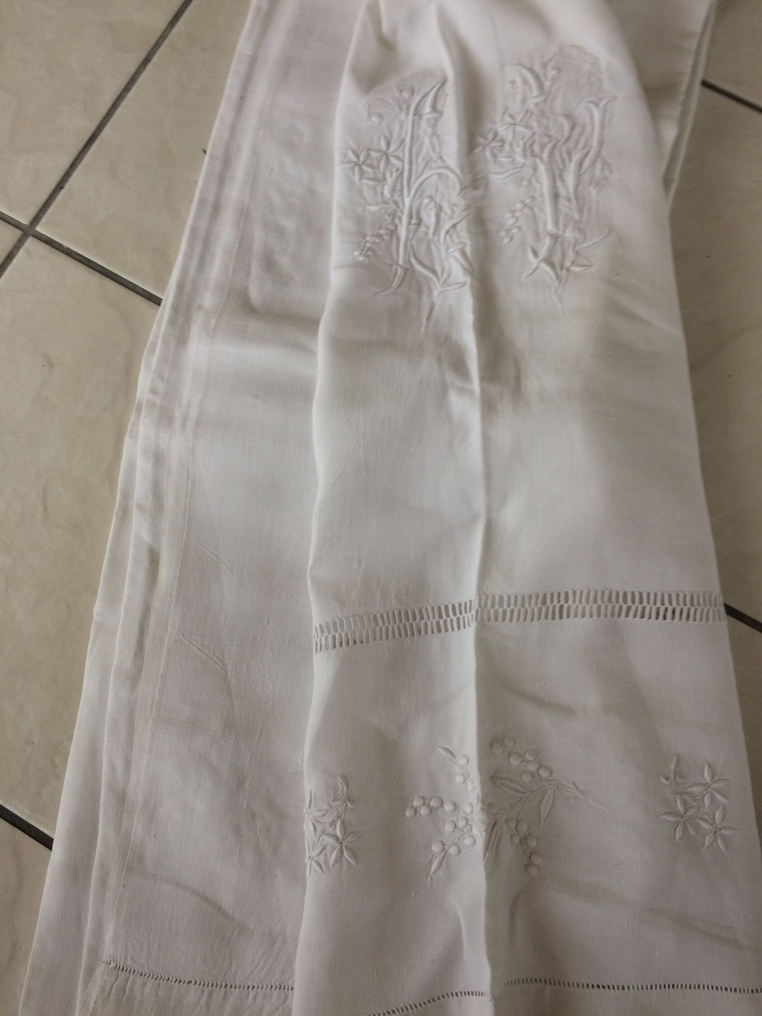 Antique linen sheet with days, embroideries and monograms worked