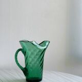 Green blown glass pitcher, unique twisted design
