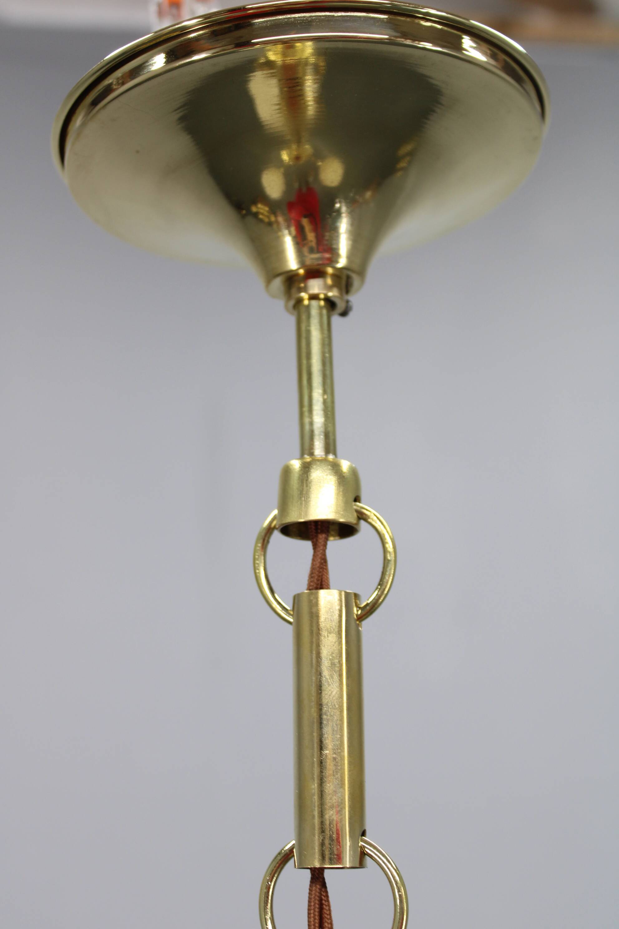 1930s Art Deco brass chandelier with textured glass globes, Czechoslovakia