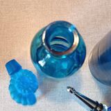 Set of two blue glass bottles