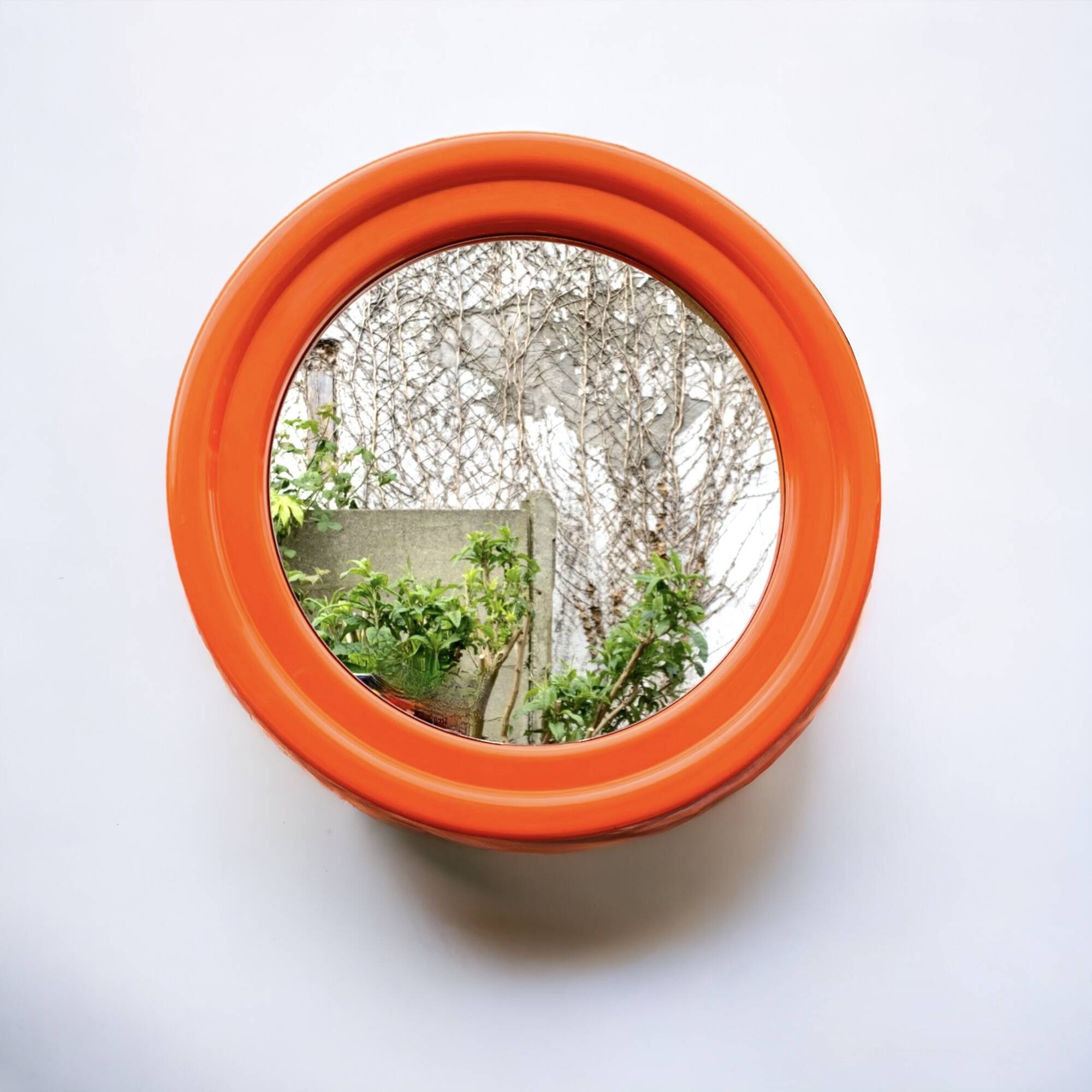 Vintage round orange plastic mirror Cattaneo - Space Age Design