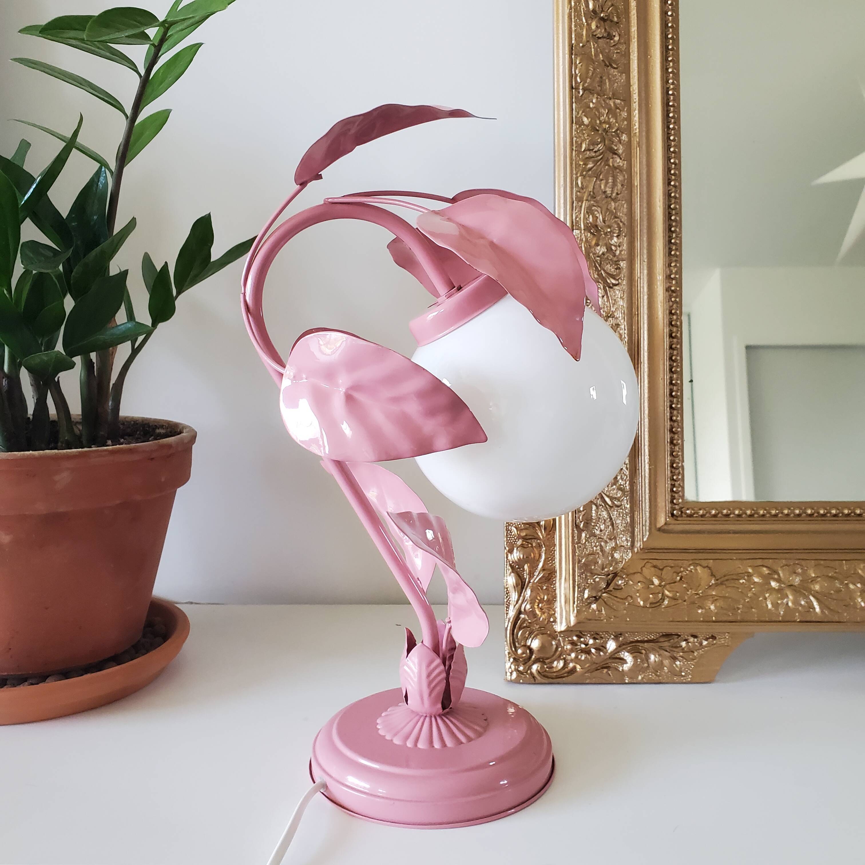 Opaline bedside lamp and pink leaves
