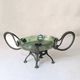 Art Nouveau cup in iridescent glass and bronze-style metal