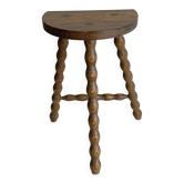 Antique three-legged twisted wooden stool