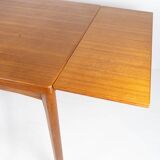 Dining table with extentions in teak designed by Henning Kjærnulf from the 1960s.