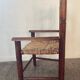 Vintage wooden armchair and straw seat for children