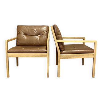 Duo of Scandinavian designer leather armchairs "Bernt Petersen" 1960.
