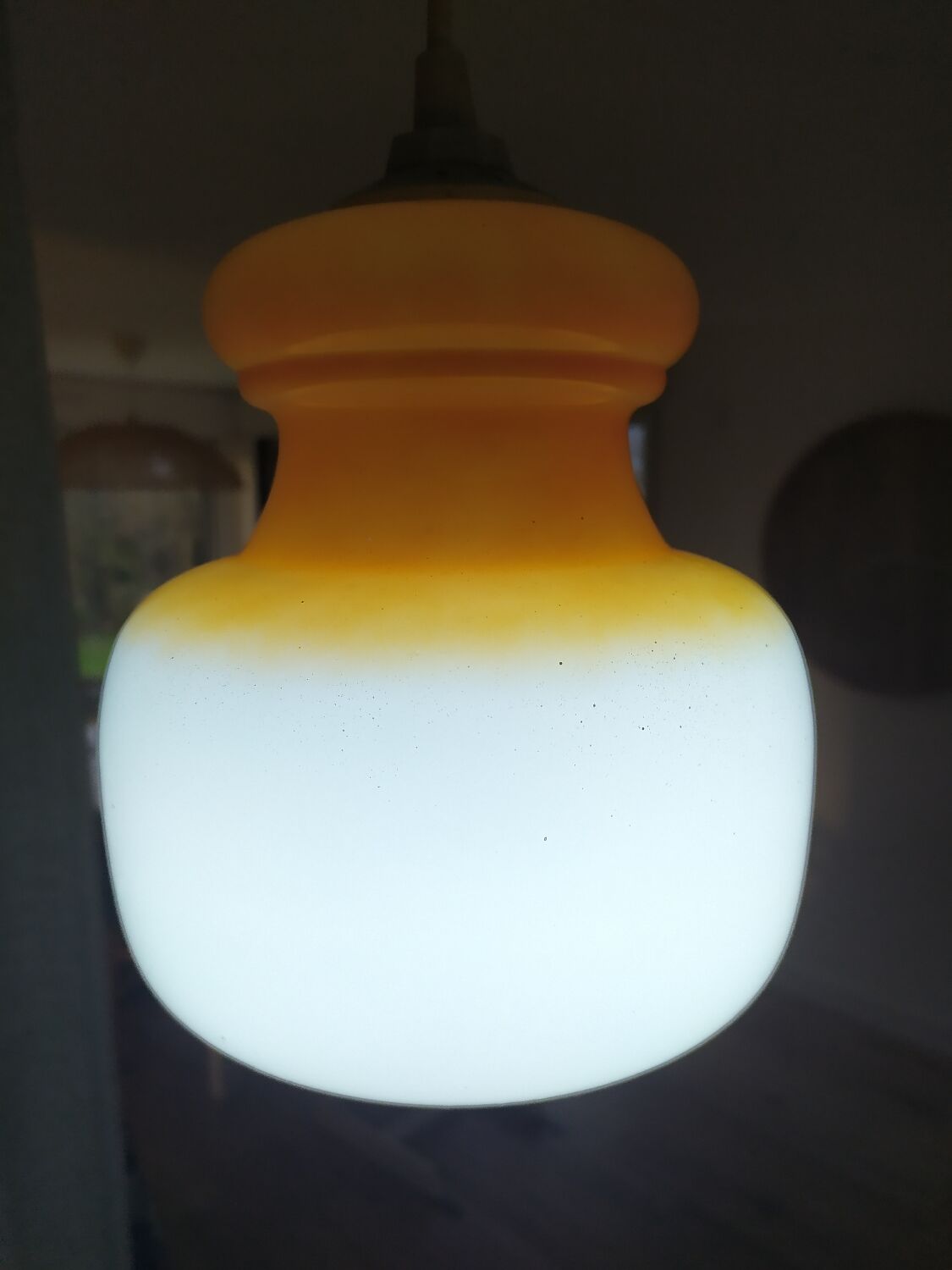 Pendant light in orange and white opaline