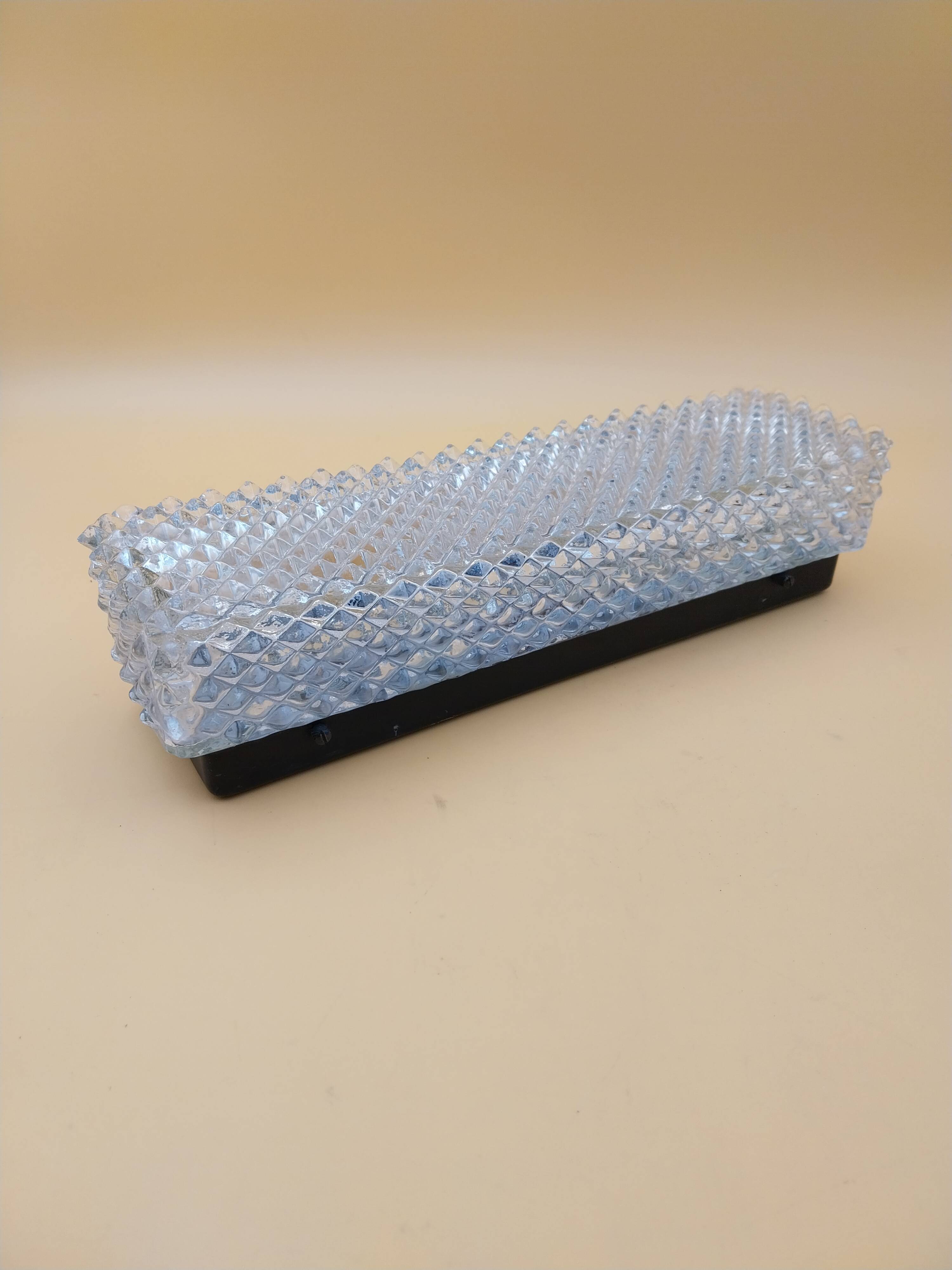 Applique en verre et métal