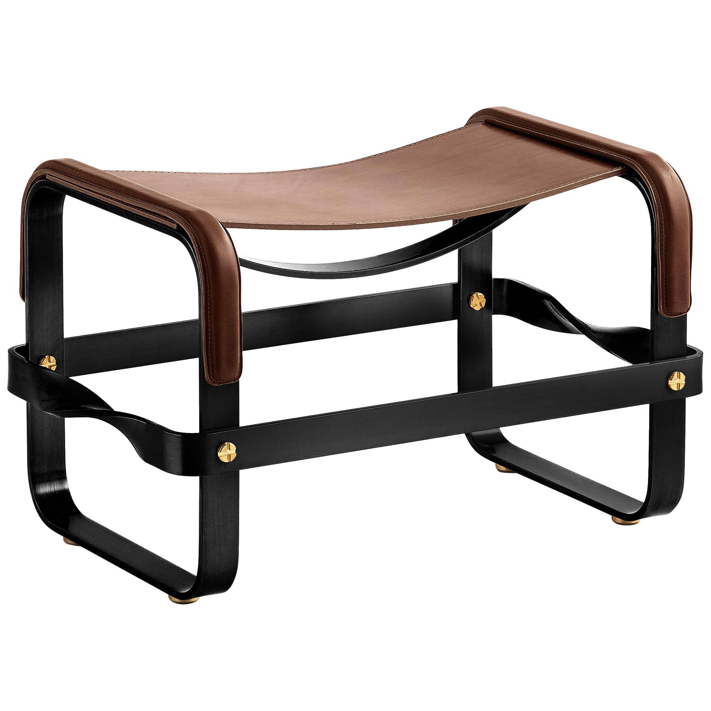 Smoky steel footrest in black and dark brown leather, contemporary style.