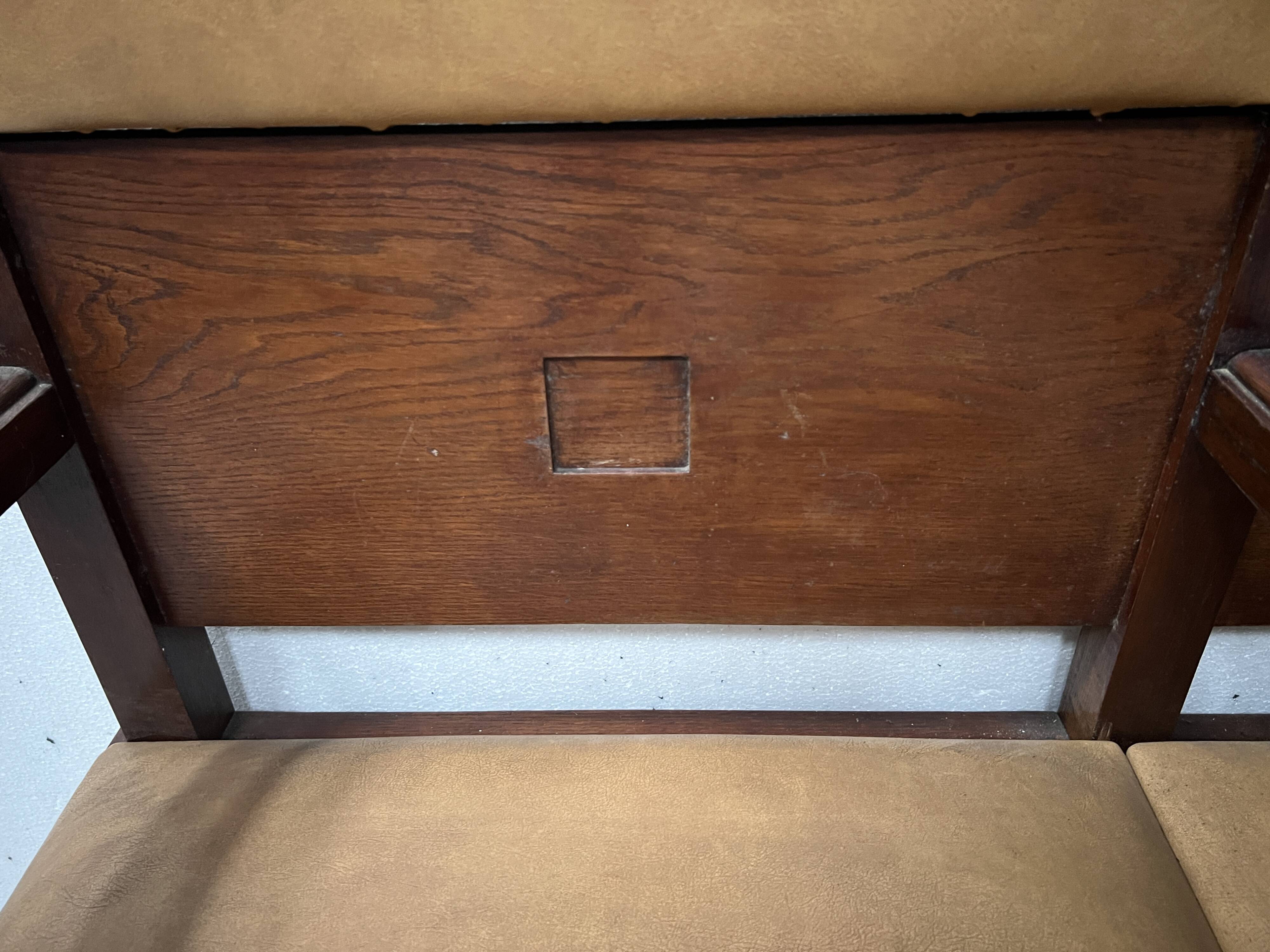 Art Deco two-seater bench in solid mahogany, 20th century.