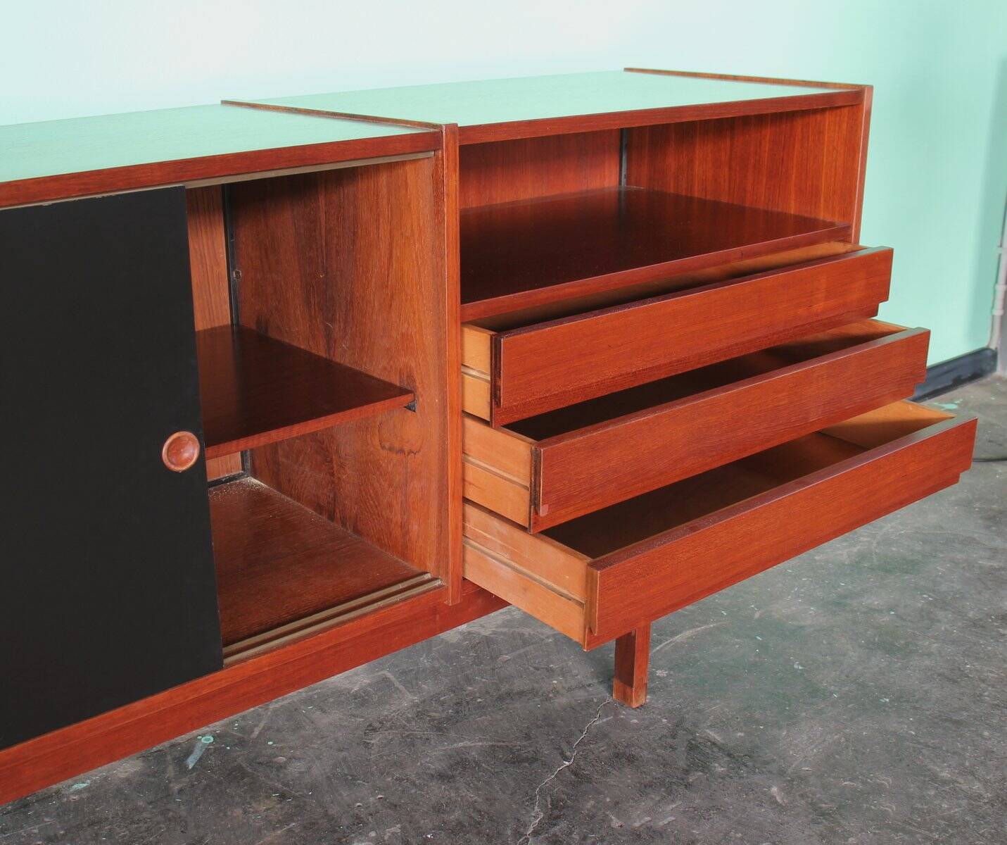 Enfilade or Mid-Century sideboard with sliding doors in black laminate by Saporiti Italia, Italy.