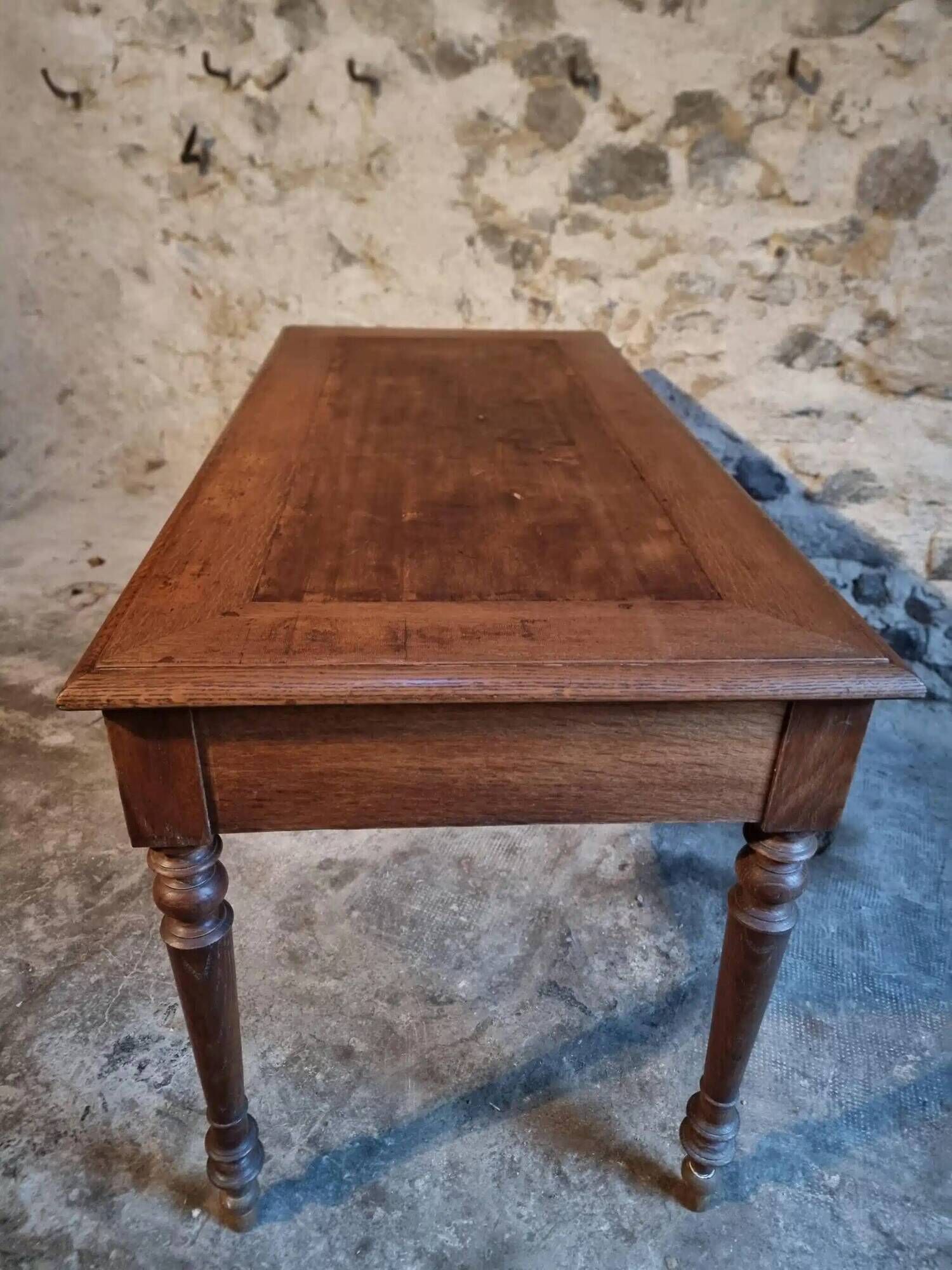 Antique French writing desk in oak with two drawers, 1920s.