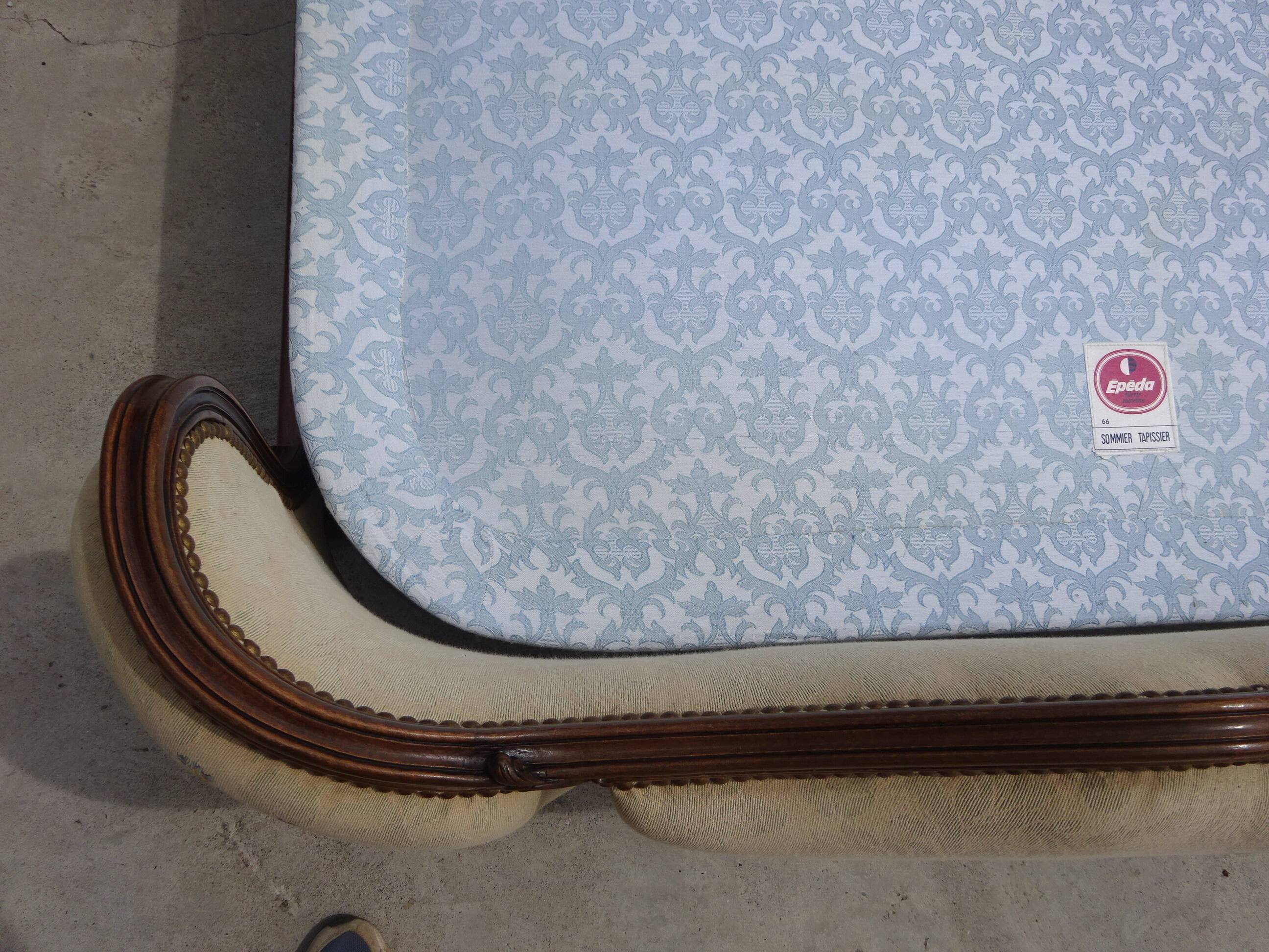 Solid wood bed frame with Jacquard fabric.