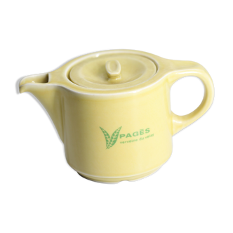 Old yellow ceramic teapot