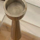 Pair of polished aluminium candlesticks