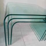 Suite of 3 nesting tables in curved glass from the 80s.