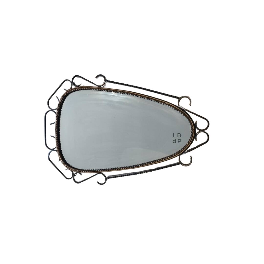 Brutalist antique mirror, sixties era.
