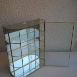 Laiton and glass window