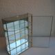 Laiton and glass window
