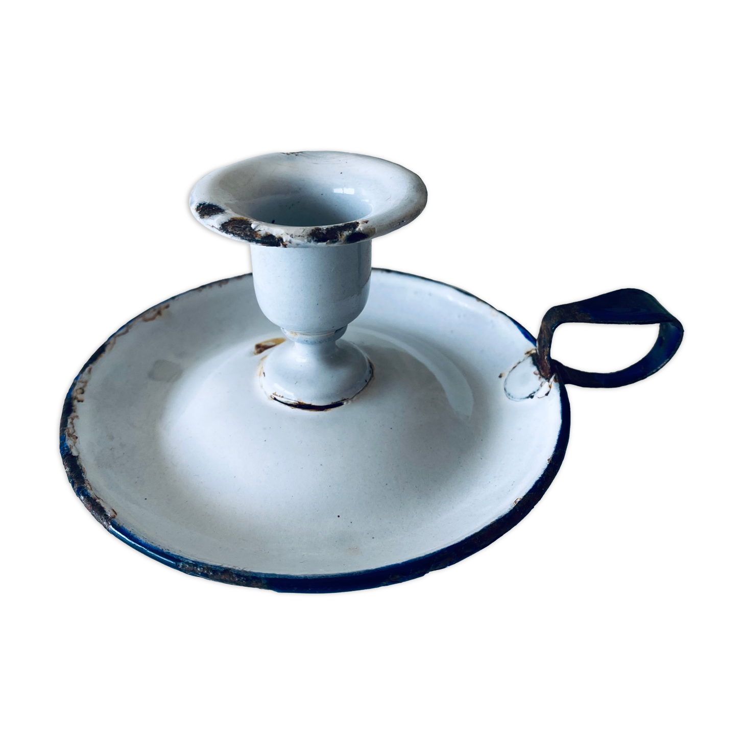 Antique candle holder in white and blue enamelled metal
