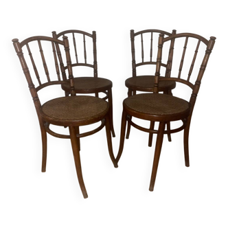 Lot de 4 chaises en bois assise en cannage en bois vintage . Fischel