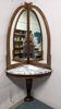 Console and its Art Deco corner mirror in walnut, France circa 1920.