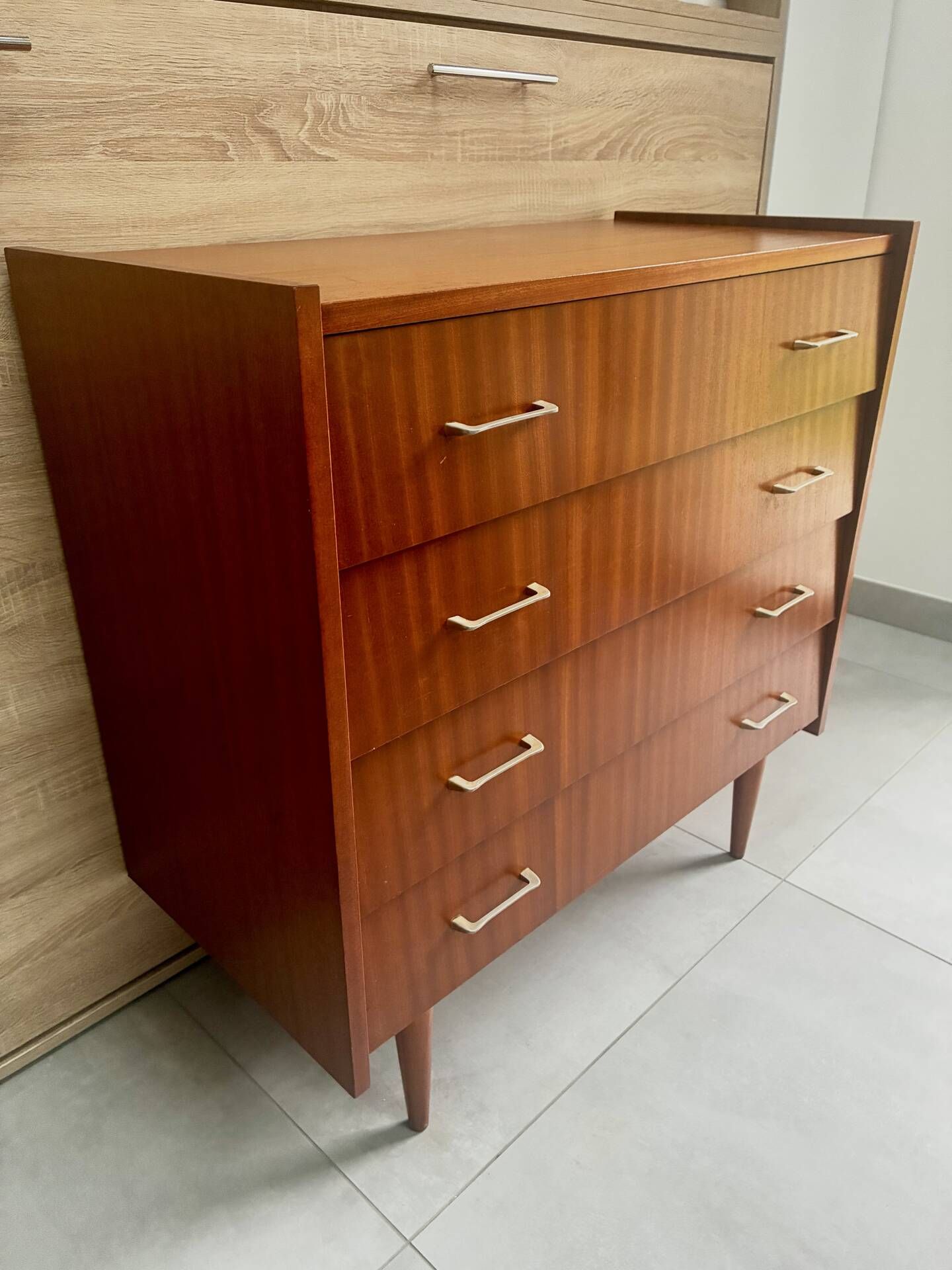 Vintage teak chest of drawers with 4 drawers from the 1960s.