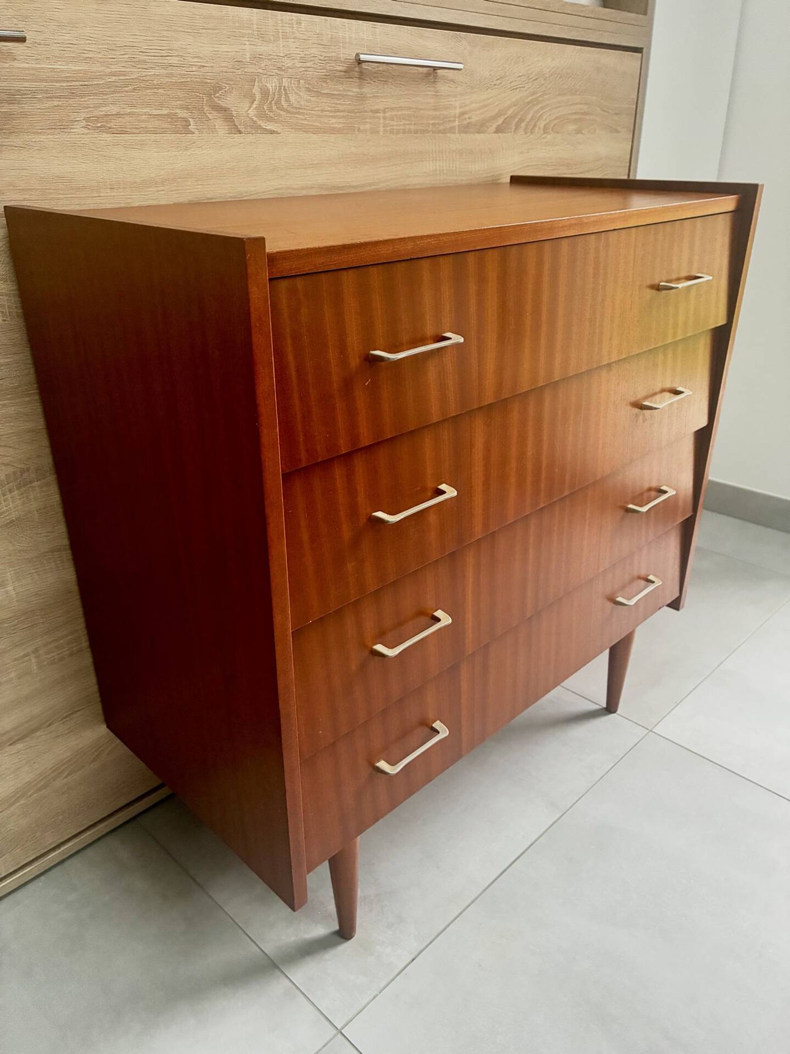 Vintage teak chest of drawers with 4 drawers from the 1960s.