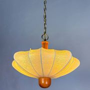 1960s Italian cocoon suspension, made of resin and pine wood.