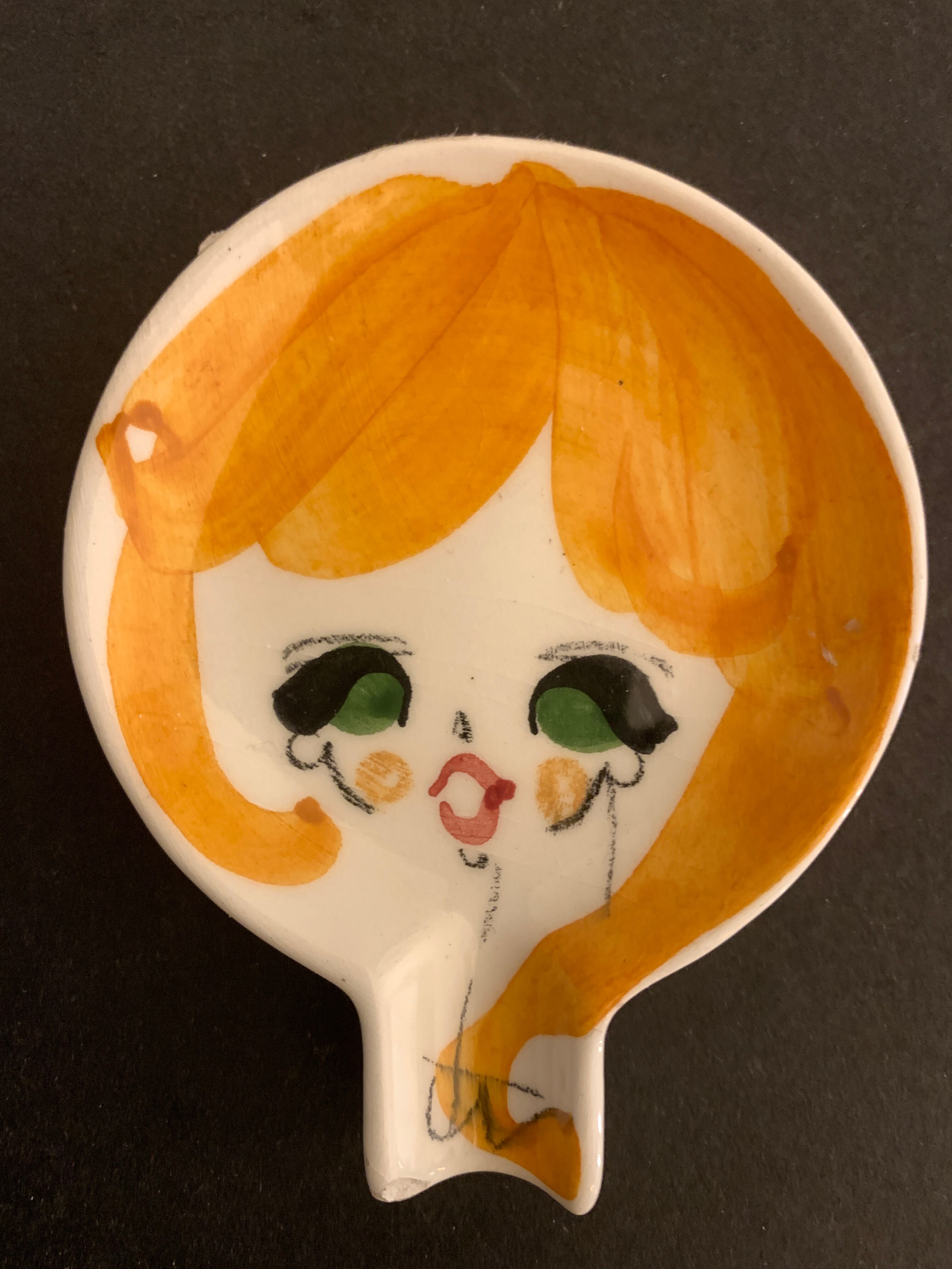 4 individual Italian ceramic stackable ashtrays with women's faces