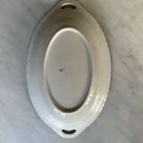 Antique oval dish with handles in earthenware