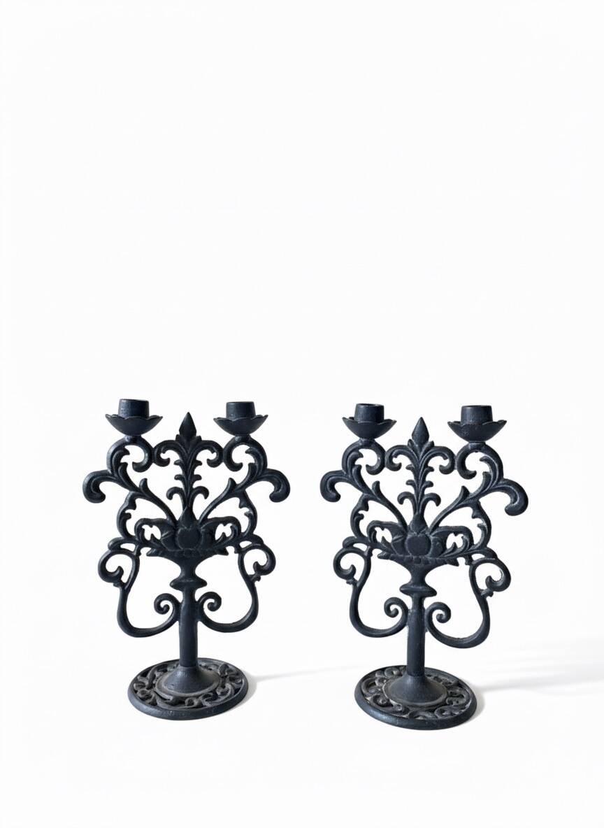 Black cast iron candlesticks, early 20th century, Neo-Rococo