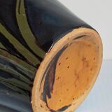 Old enameled earthenware vase with daffodils early 20th century