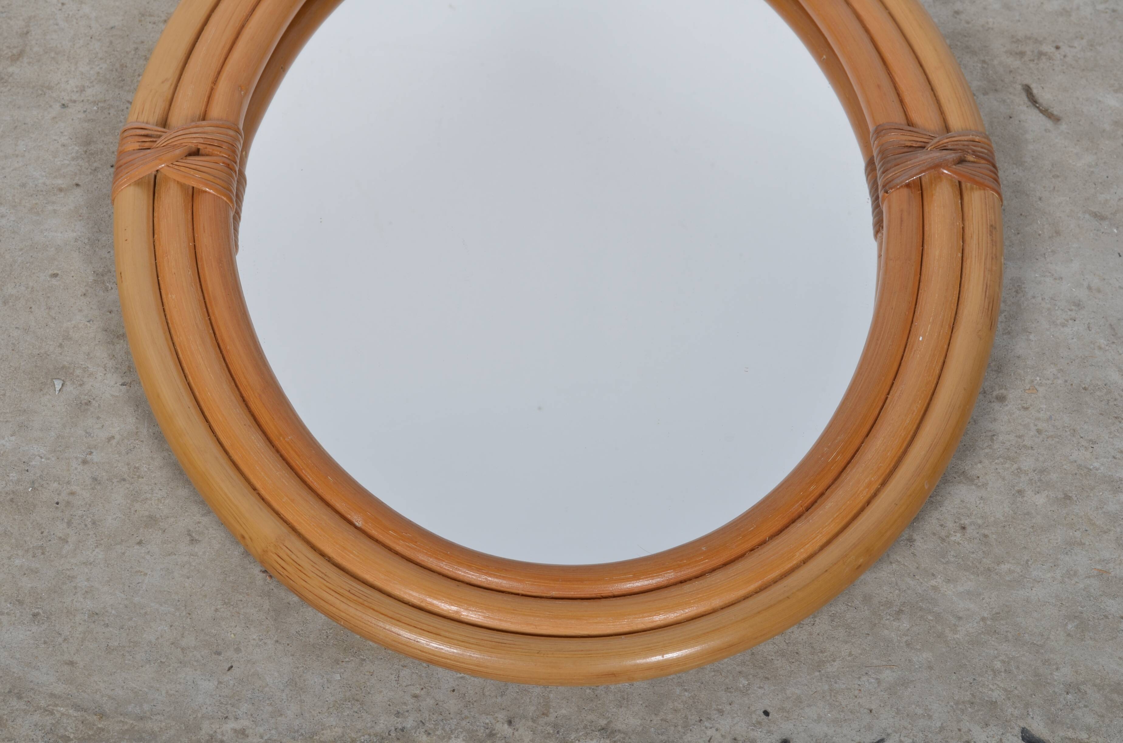 Oval rattan mirror