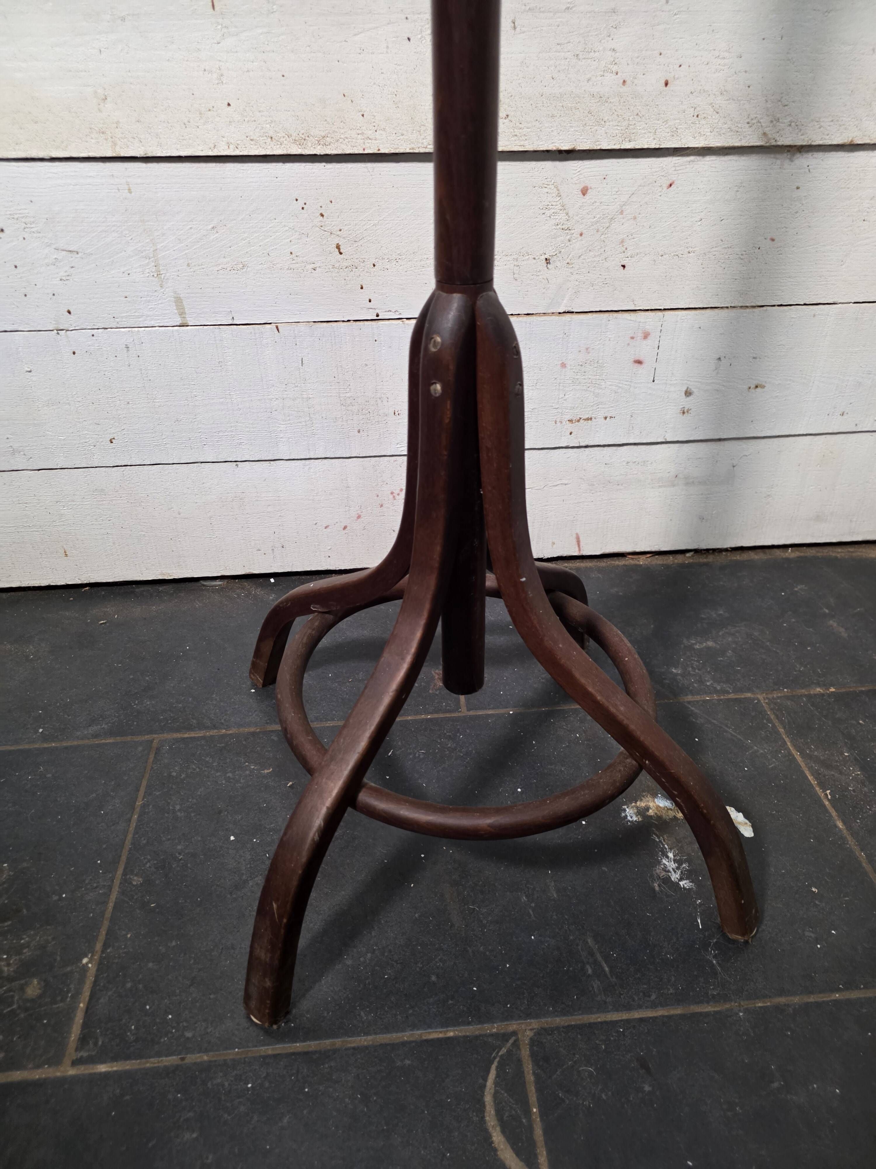Curved antique wooden parrot