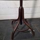Curved antique wooden parrot