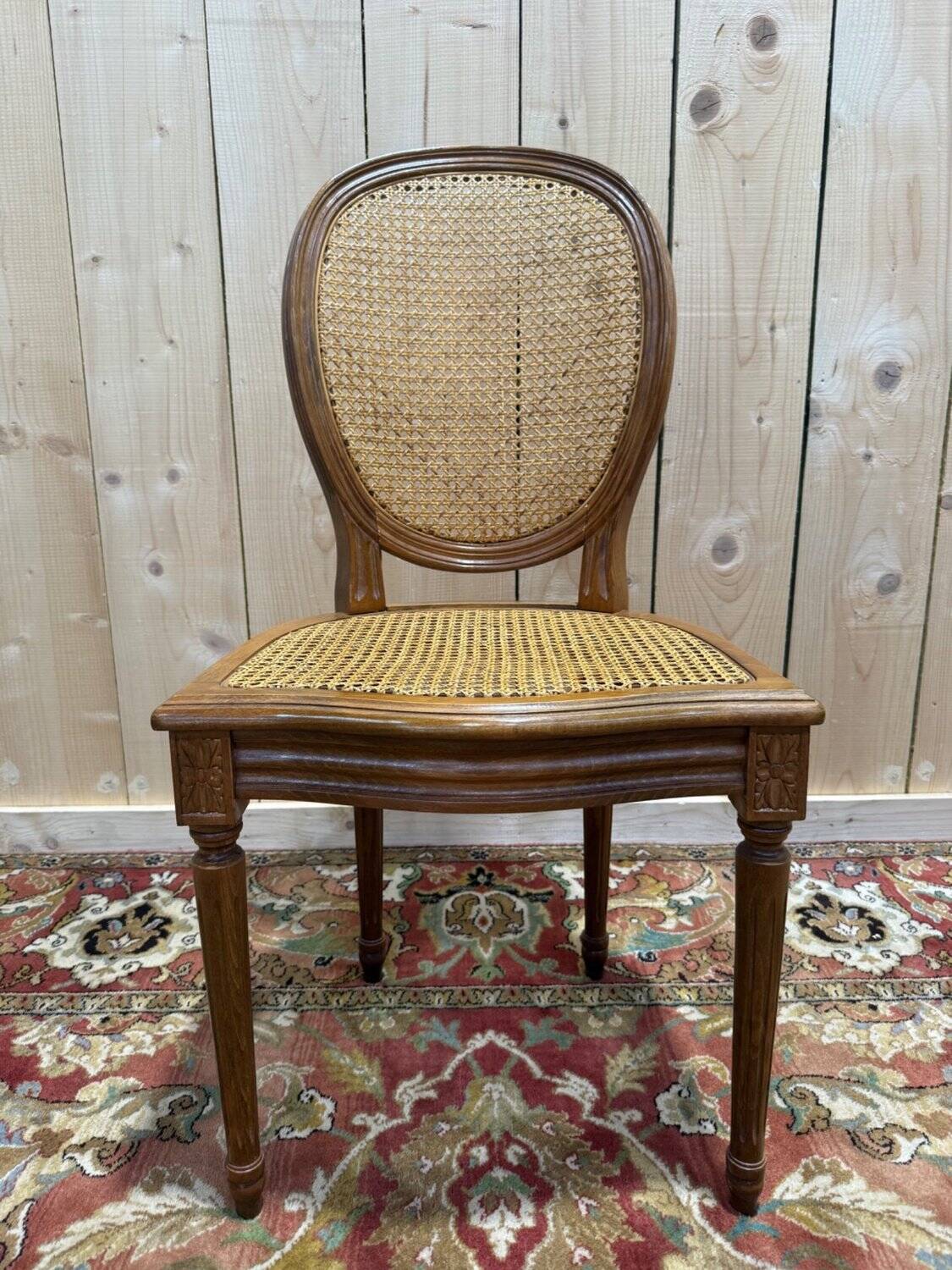 Set of 6 Louis XVI medallion chairs with caning.