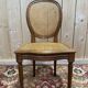 Suite de 6 chaises médaillon Louis XVI en cannage