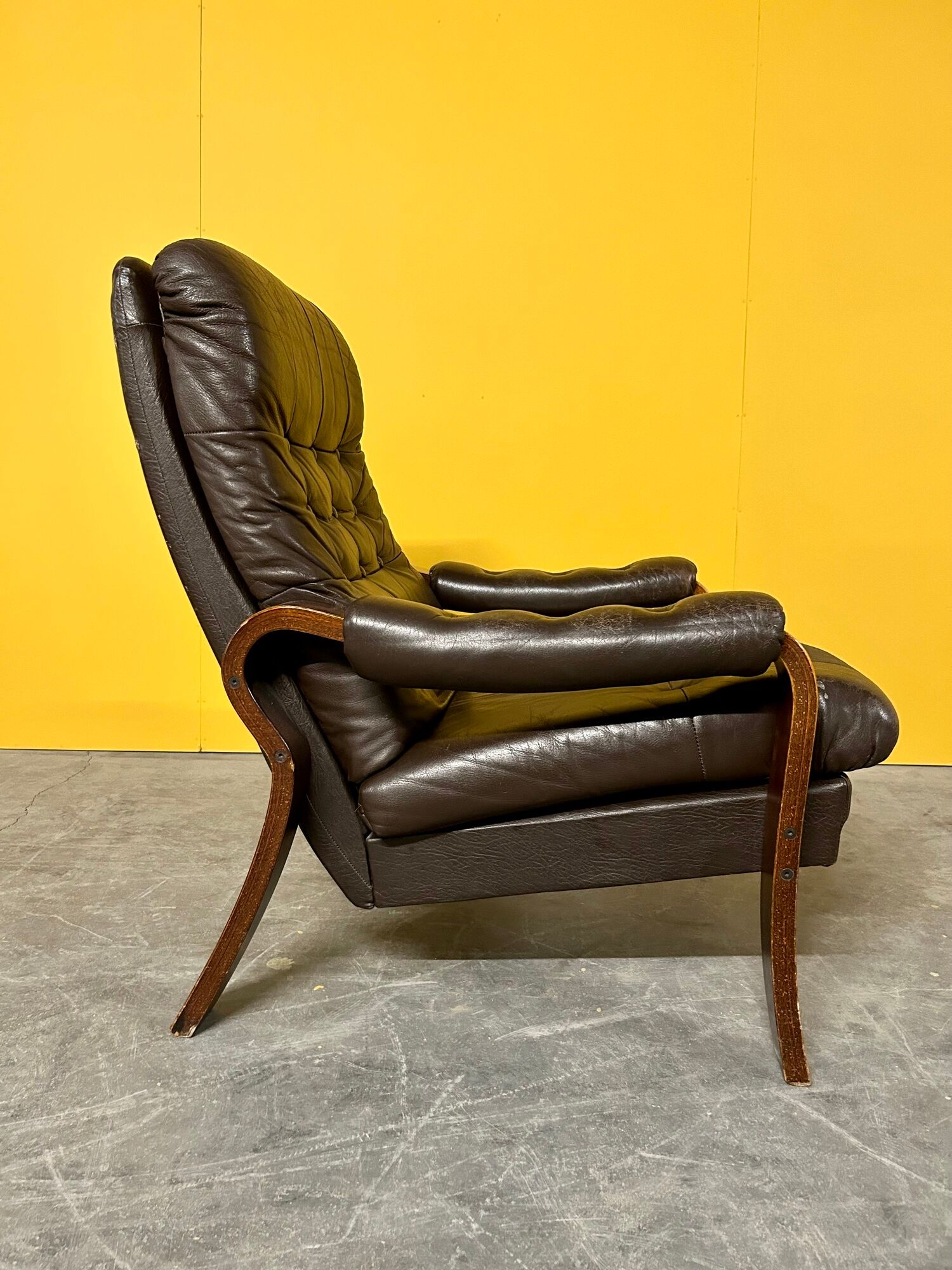 Vintage Scandinavian brown leather armchair 1960s