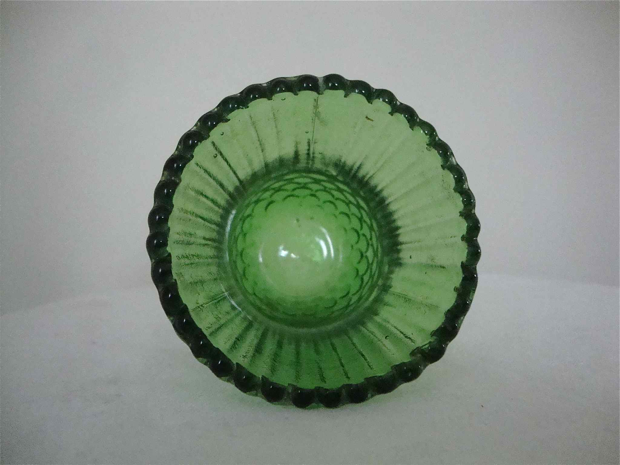 Very small green vase bottle