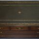 Reprodux Bevan Funnell chest of drawers with a leather top