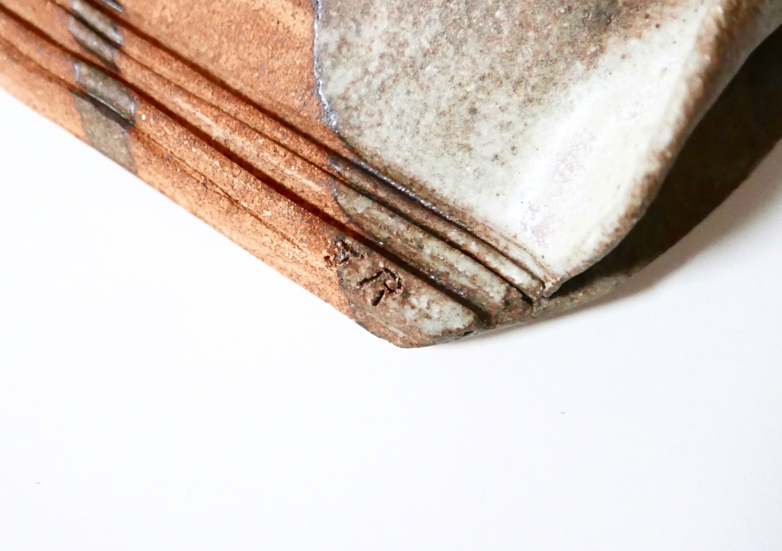 Signed sandstone wall vase, 70s