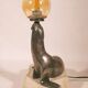 Lampe "otarie" art deco en bronze argenté