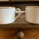 Duo of tea cups gold border Bernardaud Limoges