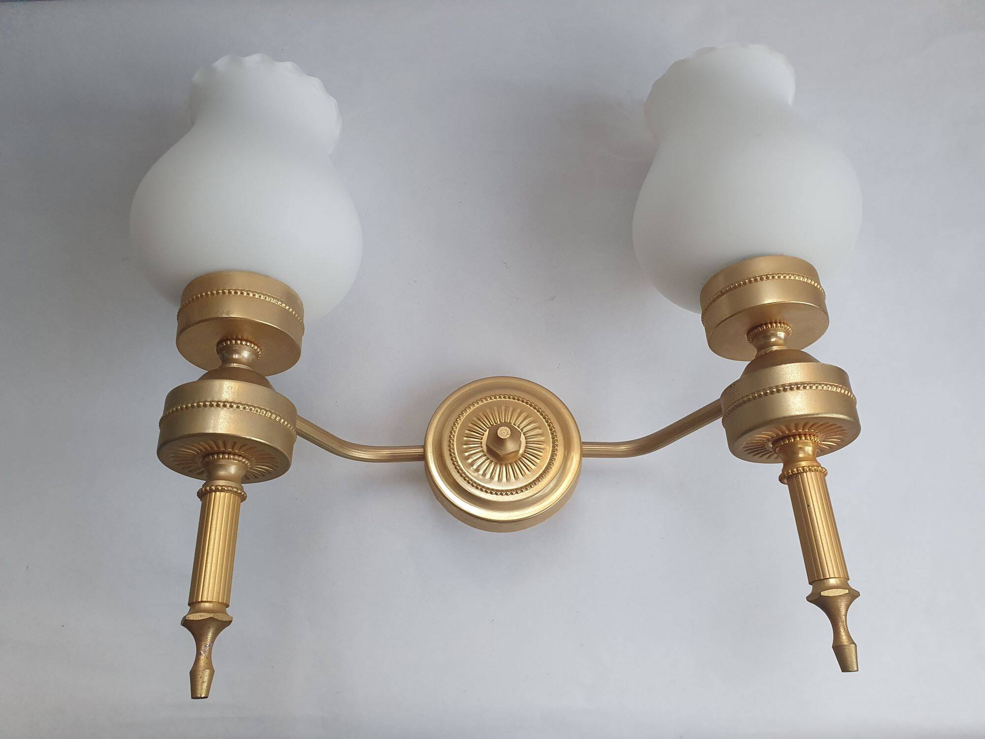 Trois appliques murales dorées flambeau style Empire