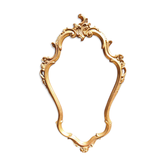 Baroque frame in carved gilded wood