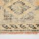 Tapis vintage à décor géométrique orange et crème