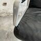 Wilkhahn Delta lounge chair in black leather with polished aluminum base and footrest (1970s)